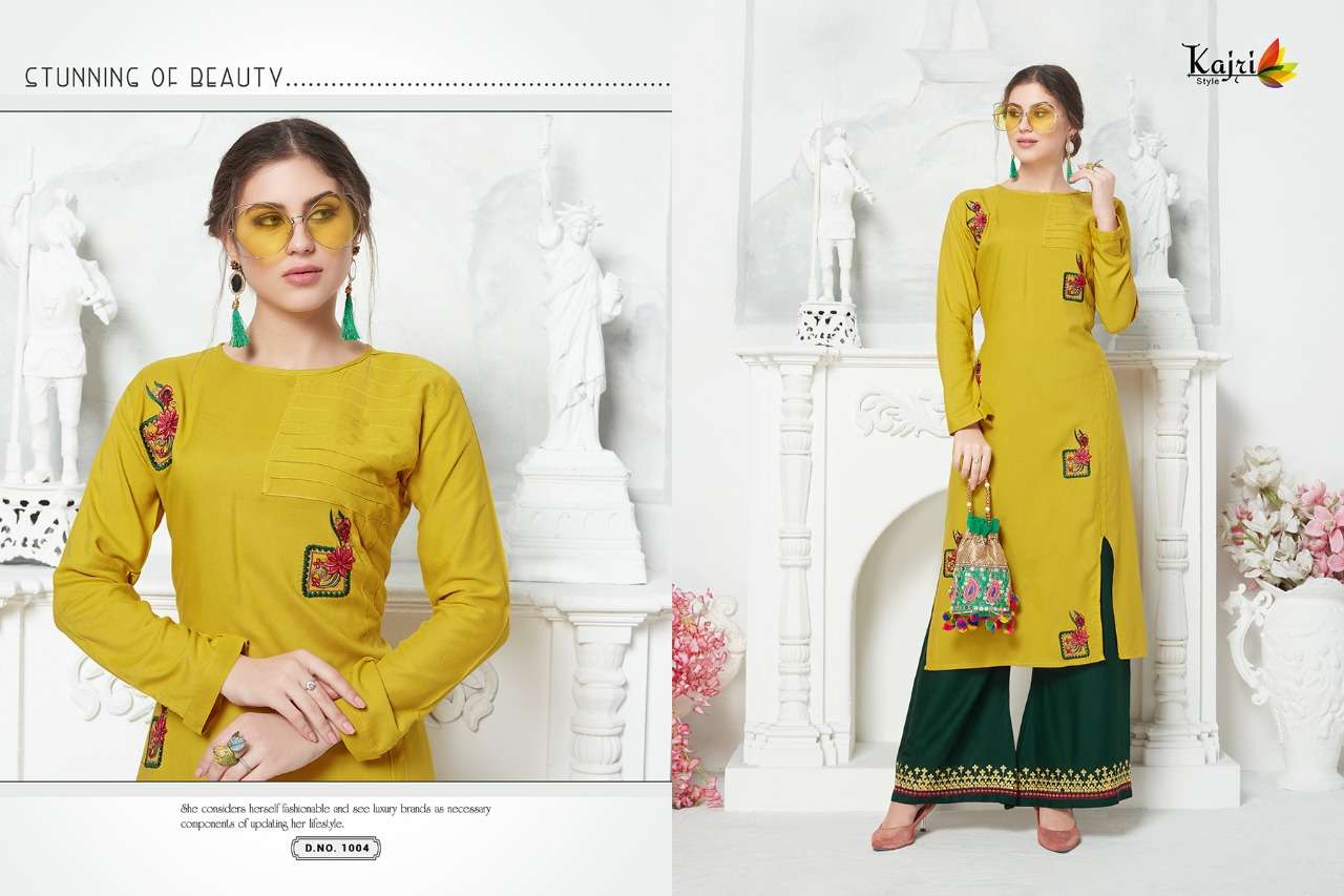 NOOR VOL-5 BY KAJRI STYLE 1001 TO 1008 SERIES BEAUTIFUL COLORFUL STYLISH FANCY CASUAL WEAR & ETHNIC WEAR & READY TO WEAR RAYON WITH HEAVY WORK KURTIS AT WHOLESALE PRICE