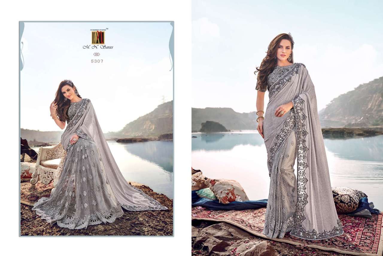SWAROVSKI BY M.N. SAREES 5301 TO 5317 SERIES INDIAN TRADITIONAL WEAR COLLECTION BEAUTIFUL STYLISH FANCY COLORFUL PARTY WEAR & OCCASIONAL WEAR NET/KOREAN SAREES AT WHOLESALE PRICE