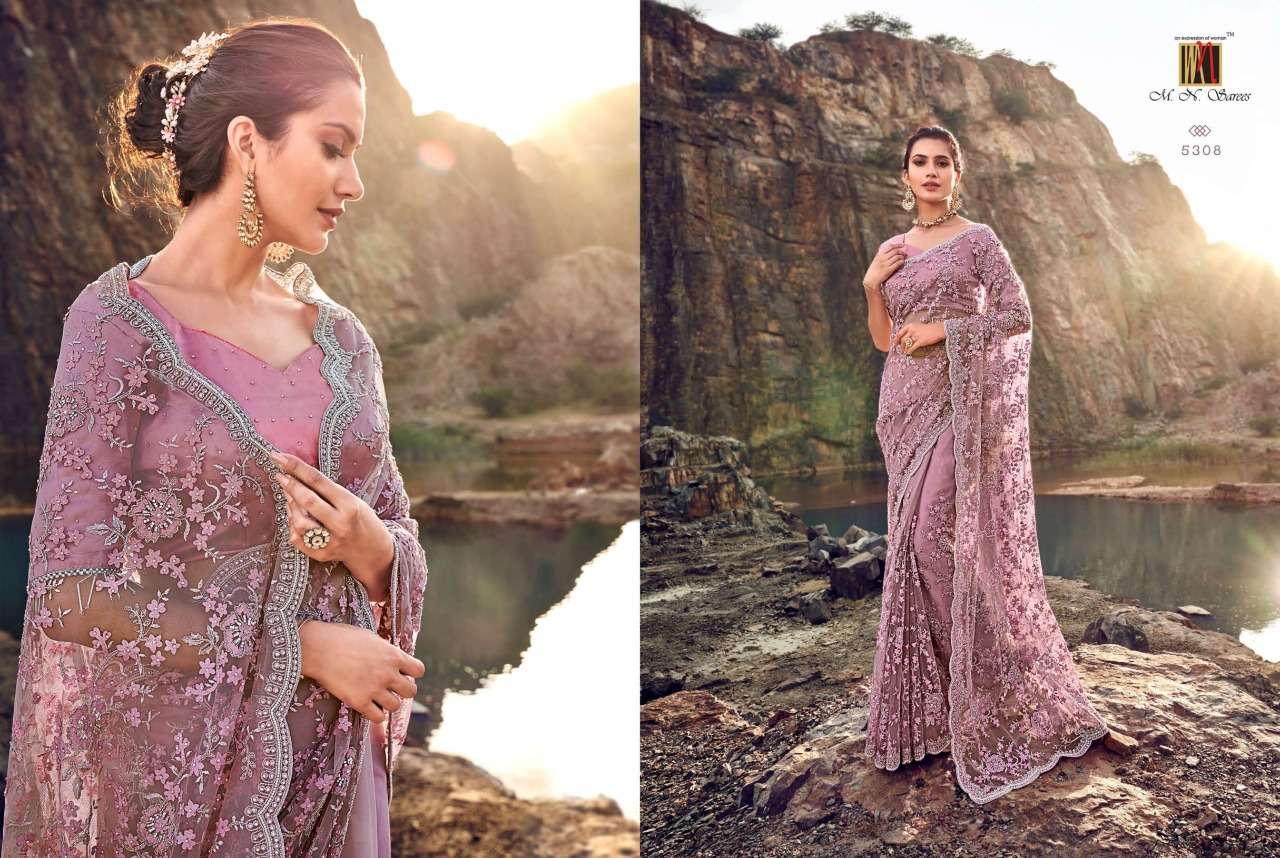 SWAROVSKI BY M.N. SAREES 5301 TO 5317 SERIES INDIAN TRADITIONAL WEAR COLLECTION BEAUTIFUL STYLISH FANCY COLORFUL PARTY WEAR & OCCASIONAL WEAR NET/KOREAN SAREES AT WHOLESALE PRICE