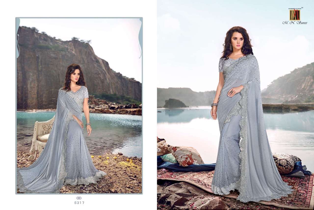 SWAROVSKI BY M.N. SAREES 5301 TO 5317 SERIES INDIAN TRADITIONAL WEAR COLLECTION BEAUTIFUL STYLISH FANCY COLORFUL PARTY WEAR & OCCASIONAL WEAR NET/KOREAN SAREES AT WHOLESALE PRICE