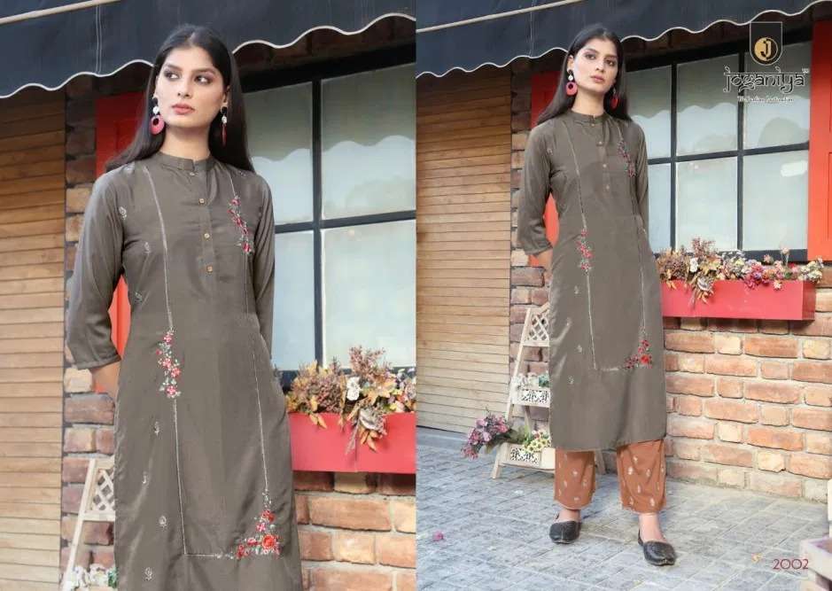 BLUSH BY JOGANIYA 2001 TO 2006 SERIES BEAUTIFUL STYLISH FANCY COLORFUL CASUAL WEAR & ETHNIC WEAR MUSLIN EMBROIDERED KURTIS WITH BOTTOM AT WHOLESALE PRICE