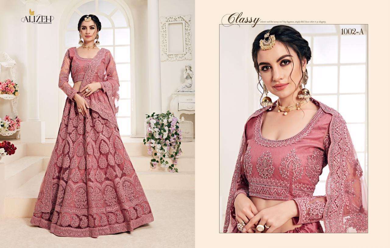 BRIDAL HERITAGE COLOUR SAGA BY ALIZEH 1001-A TO 1004-C SERIES BEAUTIFUL COLORFUL FANCY WEDDING COLLECTION OCCASIONAL WEAR & PARTY WEAR NET WITH SILK SATIN EMBROIDERY LEHENGAS AT WHOLESALE PRICE