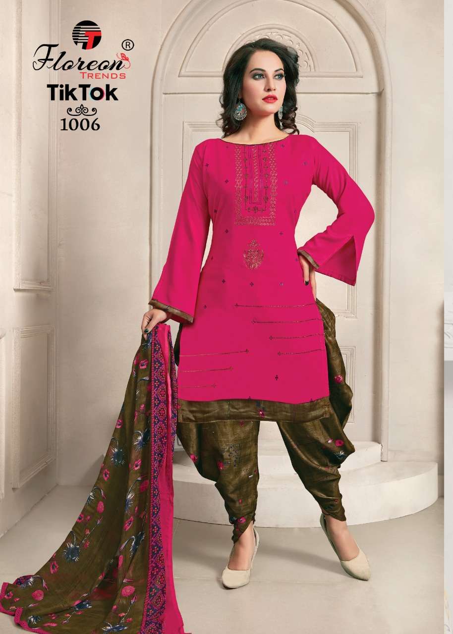 TIK TOK BY FLOREON 1001 TO 1010 SERIES BEAUTIFUL SUITS STYLISH FANCY COLORFUL PARTY WEAR & OCCASIONAL WEAR HEAVY RAYON 14 KG WITH EMBROIDERY DRESSES AT WHOLESALE PRICE