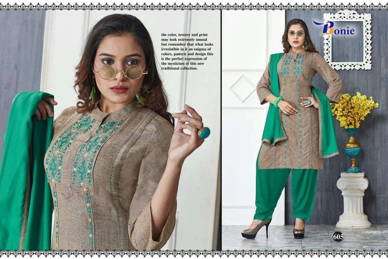 NAIRA BY BONIE 601 TO611 SERIES SUITS STYLISH BEAUTIFUL COLOURFUL PRINTED & EMBROIDERED PARTY WEAR & OCCASIONAL WEAR HEAVY RAYON 14 KG DRESSES AT WHOLESALE PRICE
