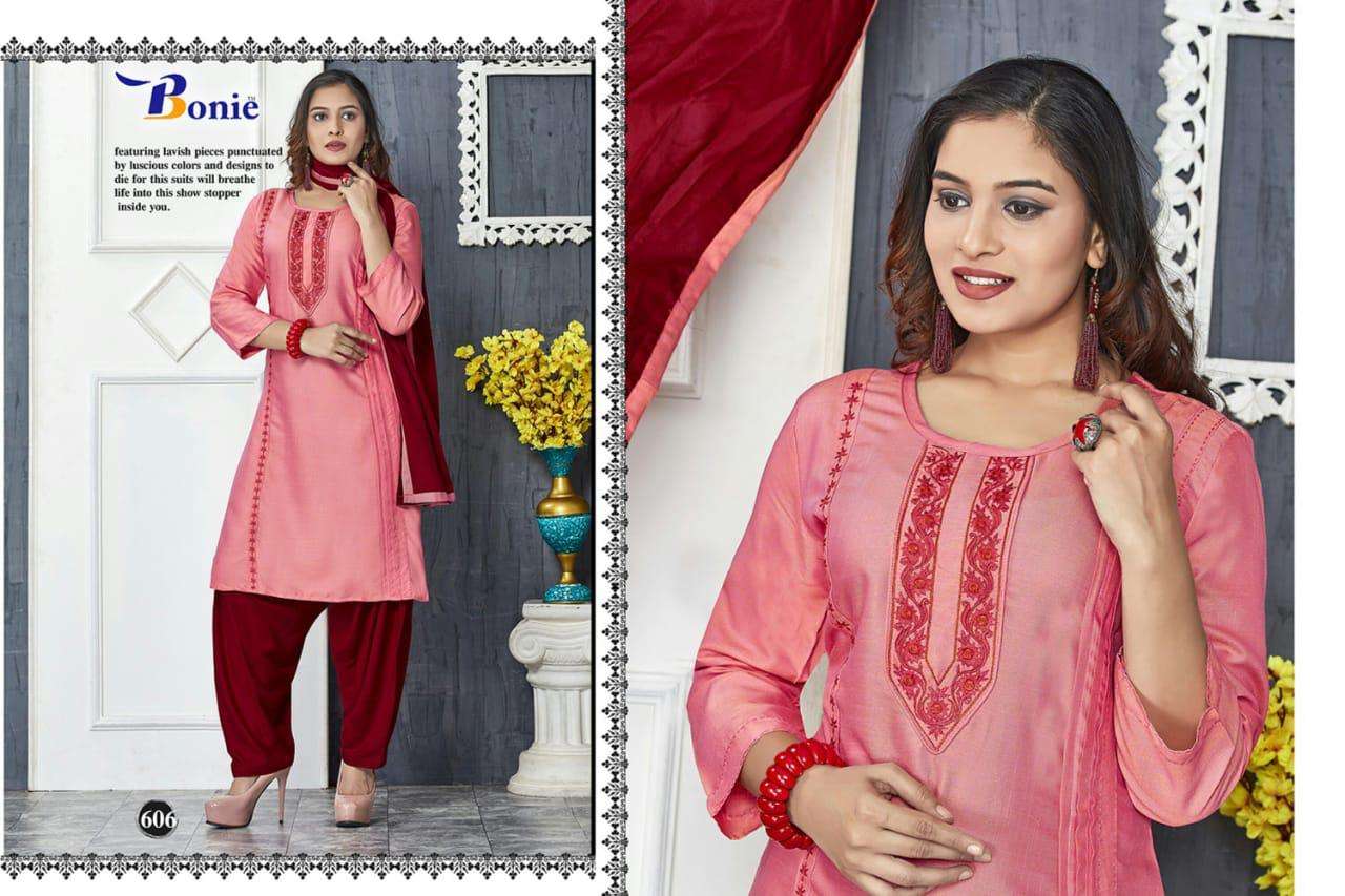 NAIRA BY BONIE 601 TO611 SERIES SUITS STYLISH BEAUTIFUL COLOURFUL PRINTED & EMBROIDERED PARTY WEAR & OCCASIONAL WEAR HEAVY RAYON 14 KG DRESSES AT WHOLESALE PRICE