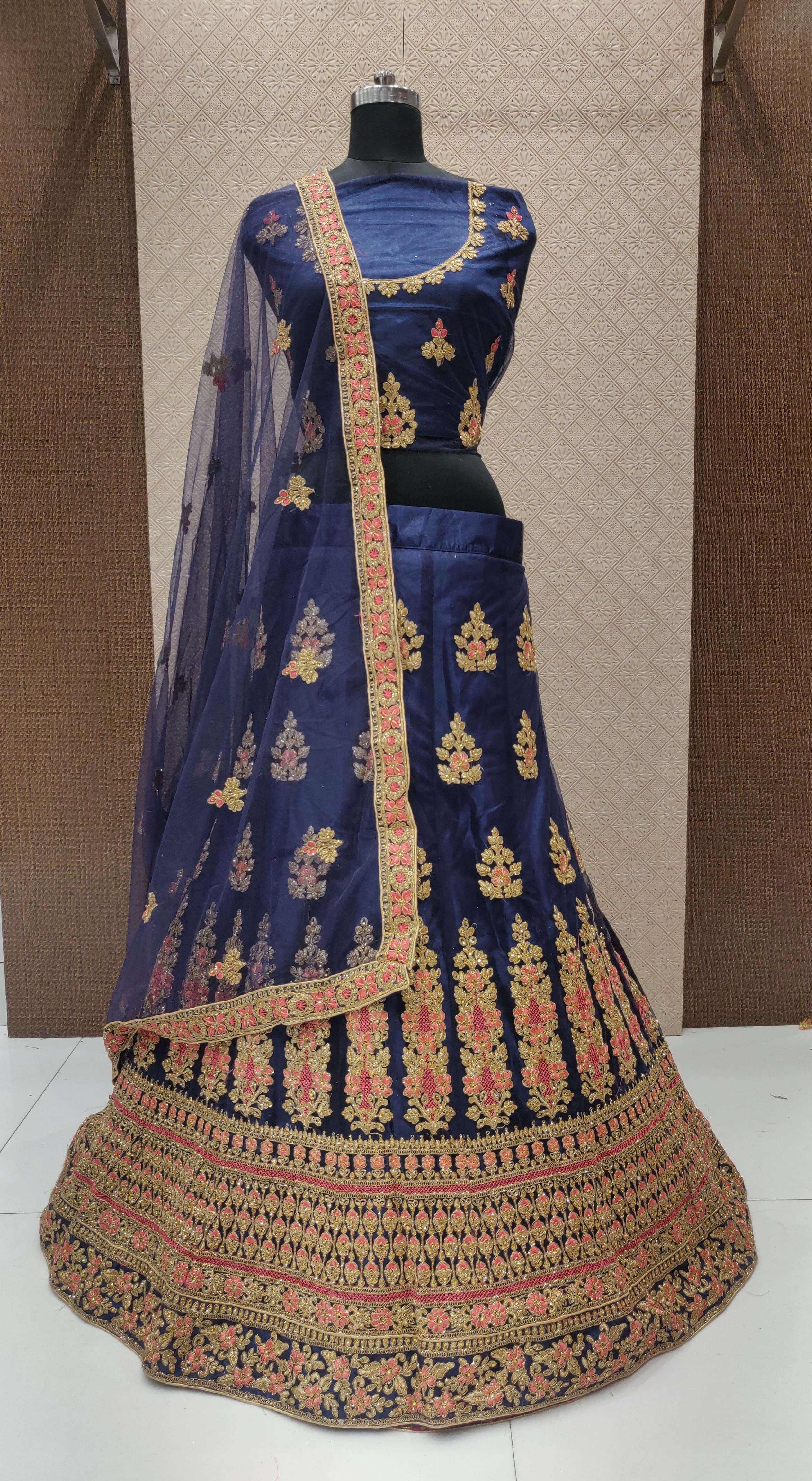 RANGMANCH BY FASHID WHOLESALE 1001 TO 1004 SERIES INDIAN DESIGNER TRADITIONAL WEAR COLLECTION BEAUTIFUL STYLISH FANCY COLORFUL PARTY WEAR & OCCASIONAL WEAR NET LEHENGAS AT WHOLESALE PRICE
