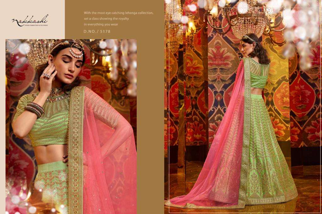 JASHN BY NAKKASHI 5173 TO 5183 SERIES BEAUTIFUL COLORFUL FANCY WEDDING COLLECTION OCCASIONAL WEAR & PARTY WEAR GREEN PURE RAW SILK LEHENGAS AT WHOLESALE PRICE
