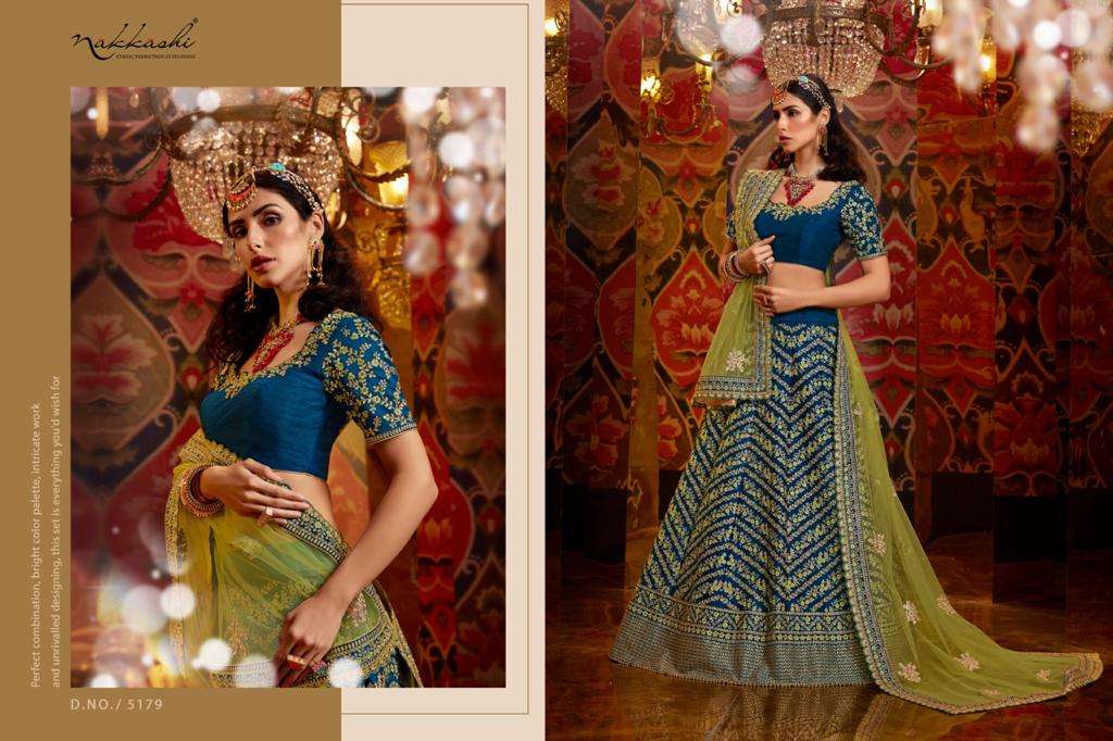 JASHN BY NAKKASHI 5173 TO 5183 SERIES BEAUTIFUL COLORFUL FANCY WEDDING COLLECTION OCCASIONAL WEAR & PARTY WEAR GREEN PURE RAW SILK LEHENGAS AT WHOLESALE PRICE