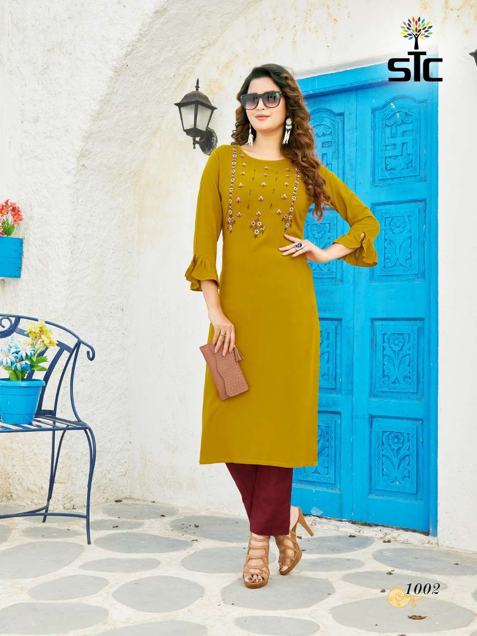 GLORIOUS BY STC 1001 TO 1005 SERIES BEAUTIFUL STYLISH FANCY COLORFUL CASUAL WEAR & ETHNIC WEAR & READY TO WEAR RAYON WORKED KURTIS WITH BOTTOM AT WHOLESALE PRICE