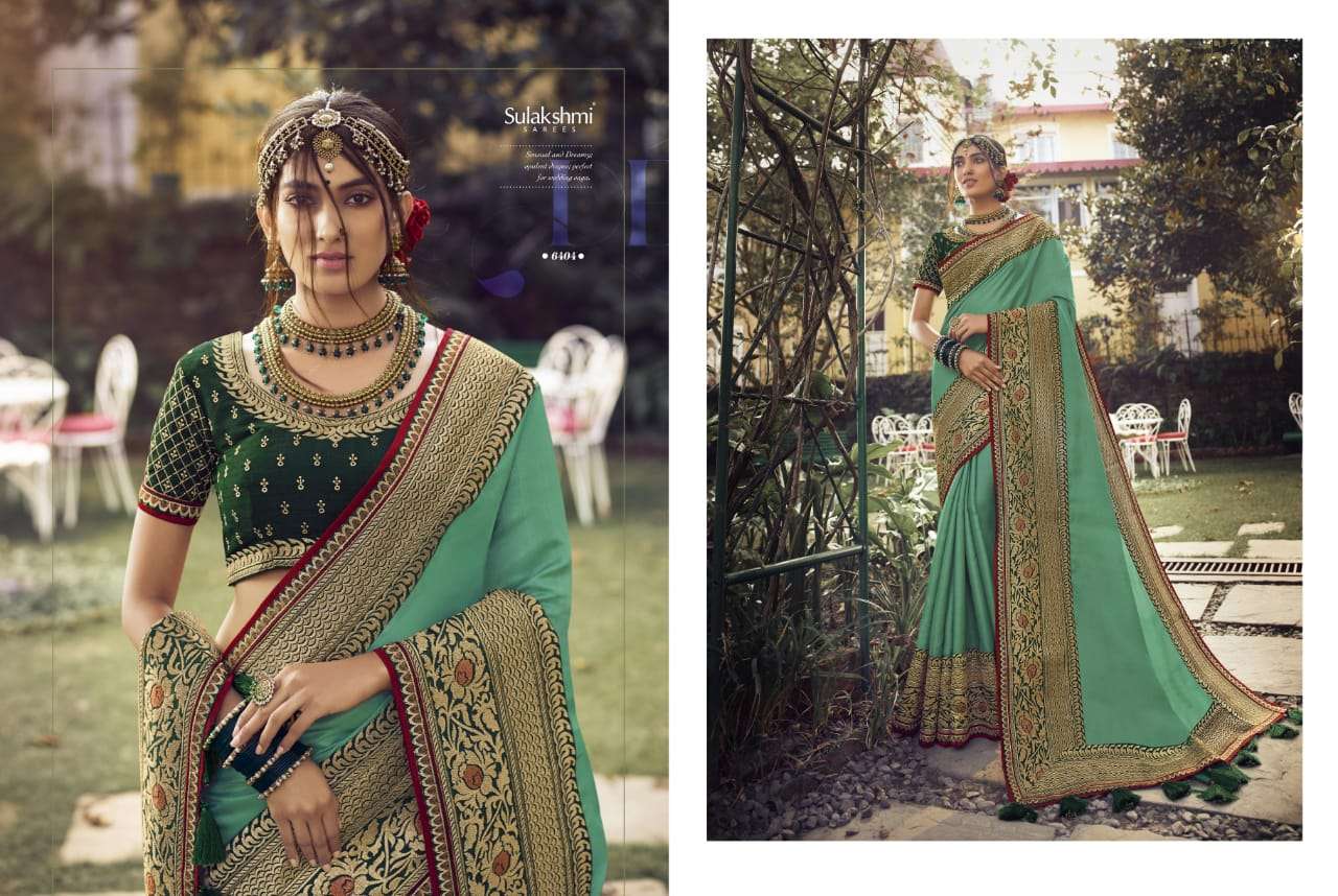 SUNSHINE BY SULAKSHMI 6401 TO 6409 SERIES INDIAN TRADITIONAL WEAR COLLECTION BEAUTIFUL STYLISH FANCY COLORFUL PARTY WEAR & OCCASIONAL WEAR CHINNON EMBROIDERY SAREES AT WHOLESALE PRICE