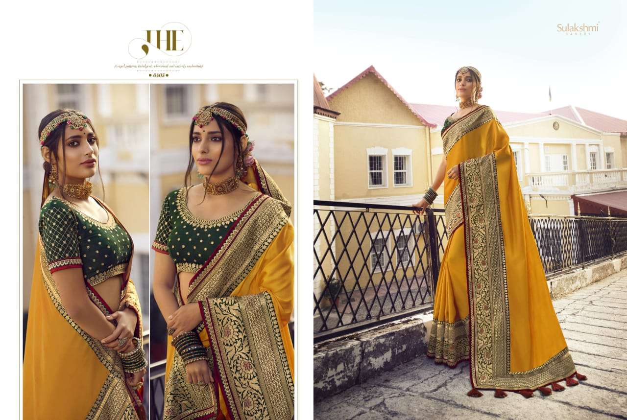 SUNSHINE BY SULAKSHMI 6401 TO 6409 SERIES INDIAN TRADITIONAL WEAR COLLECTION BEAUTIFUL STYLISH FANCY COLORFUL PARTY WEAR & OCCASIONAL WEAR CHINNON EMBROIDERY SAREES AT WHOLESALE PRICE
