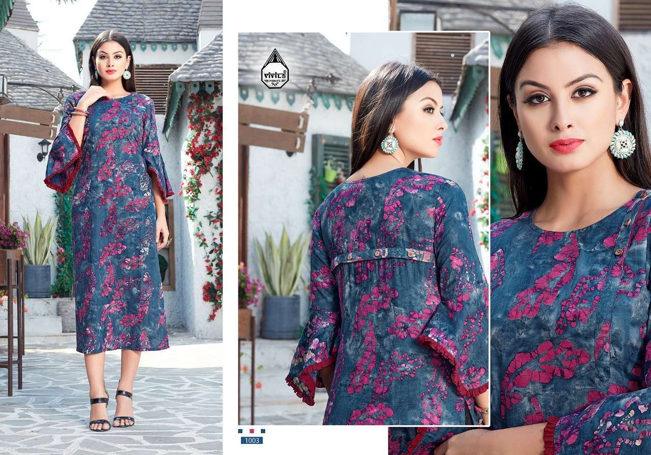 SEVEN STAR BY VIVILS PRINTS 1001 TO 1007 SERIES DESIGNER WEDDING COLLECTION BEAUTIFUL STYLISH FANCY COLORFUL PARTY WEAR & OCCASIONAL WEAR PURE COTTON KURTIS AT WHOLESALE PRICE