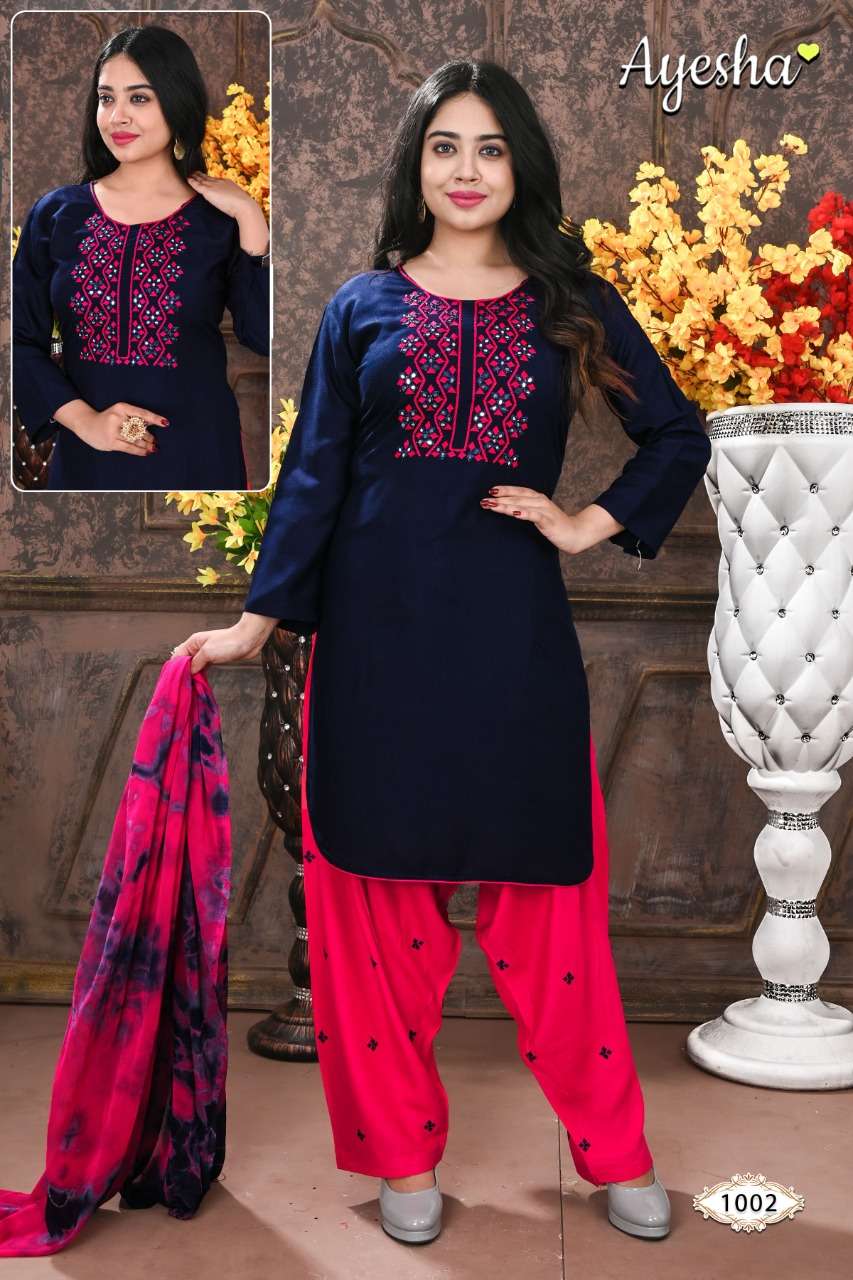 NIKKI VOL-1 BY AYESHA 1001 TO 1008 SERIES BEAUTIFUL STYLISH SHARARA SUITS FANCY COLORFUL CASUAL WEAR & ETHNIC WEAR & READY TO WEAR RAYON EMBROIDERED DRESSES AT WHOLESALE PRICE