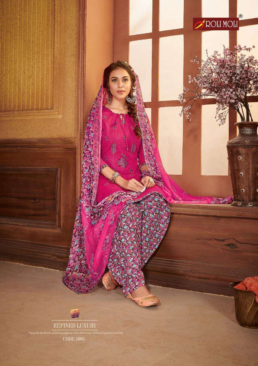 KUDI PATOLA BY ROLI MOLI 1001 TO 1008 SERIES BEAUTIFUL SUITS COLORFUL STYLISH FANCY CASUAL WEAR & ETHNIC WEAR COTTON NAGITIVE PRINT WITH EMBROIDERY WORK DRESSES AT WHOLESALE PRICE
