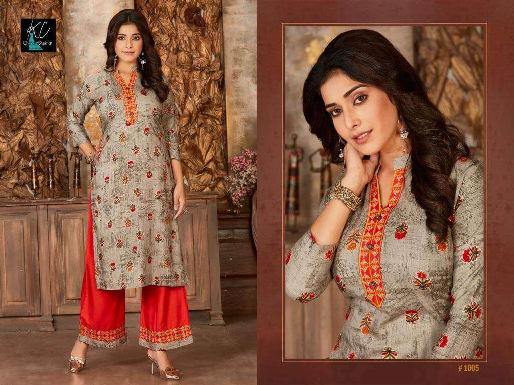 NOOR VOL-14 BY KC 1001 TO 1008 SERIES BEAUTIFUL STYLISH FANCY COLORFUL CASUAL WEAR & ETHNIC WEAR & READY TO WEAR RAYON PRINTED KURTIS WITH BOTTOM AT WHOLESALE PRICE