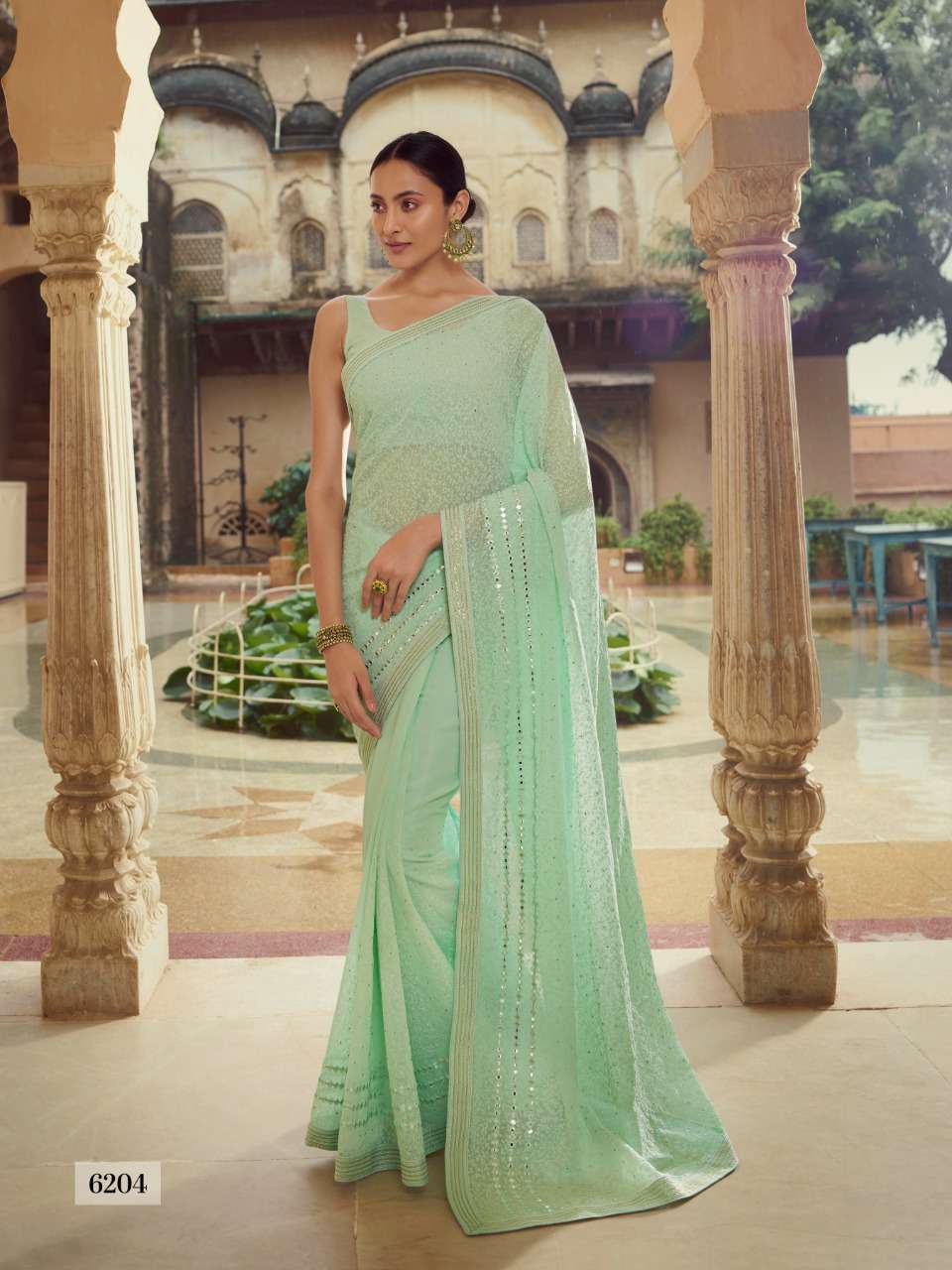 SWARNA BY ARYA DESIGNS 6201 TO 6216 SERIES INDIAN TRADITIONAL WEAR COLLECTION BEAUTIFUL STYLISH FANCY COLORFUL PARTY WEAR & OCCASIONAL WEAR SOFT NET/GEORGETTE SAREES AT WHOLESALE PRICE