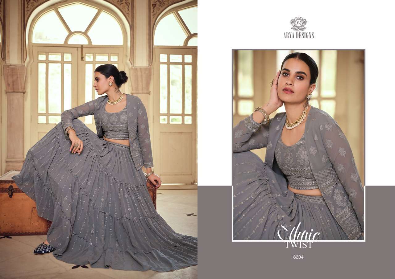 ROYAL SAGA VOL-2 BY ARYA DESIGNS 8201 TO 8207 SERIES BEAUTIFUL COLORFUL FANCY WEDDING COLLECTION OCCASIONAL WEAR & PARTY WEAR GEORGETTE/CREPE/SILK LEHENGAS AT WHOLESALE PRICE