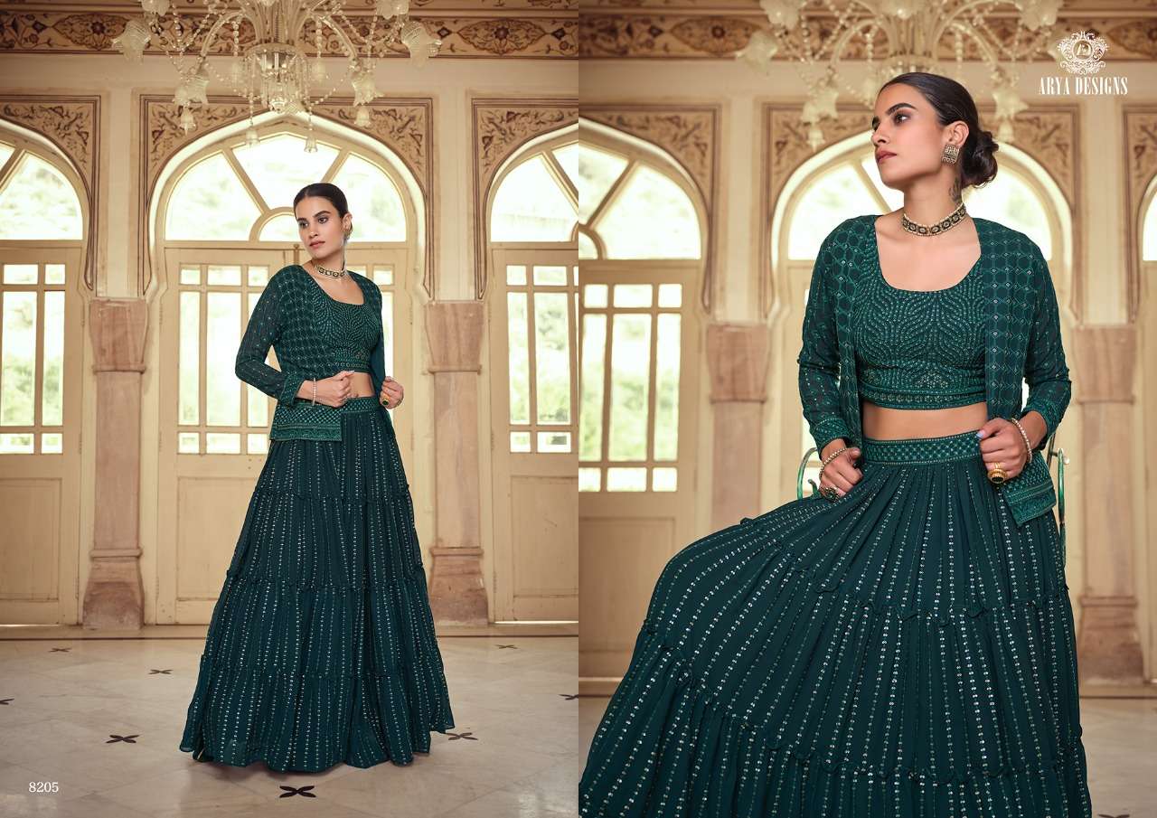 ROYAL SAGA VOL-2 BY ARYA DESIGNS 8201 TO 8207 SERIES BEAUTIFUL COLORFUL FANCY WEDDING COLLECTION OCCASIONAL WEAR & PARTY WEAR GEORGETTE/CREPE/SILK LEHENGAS AT WHOLESALE PRICE