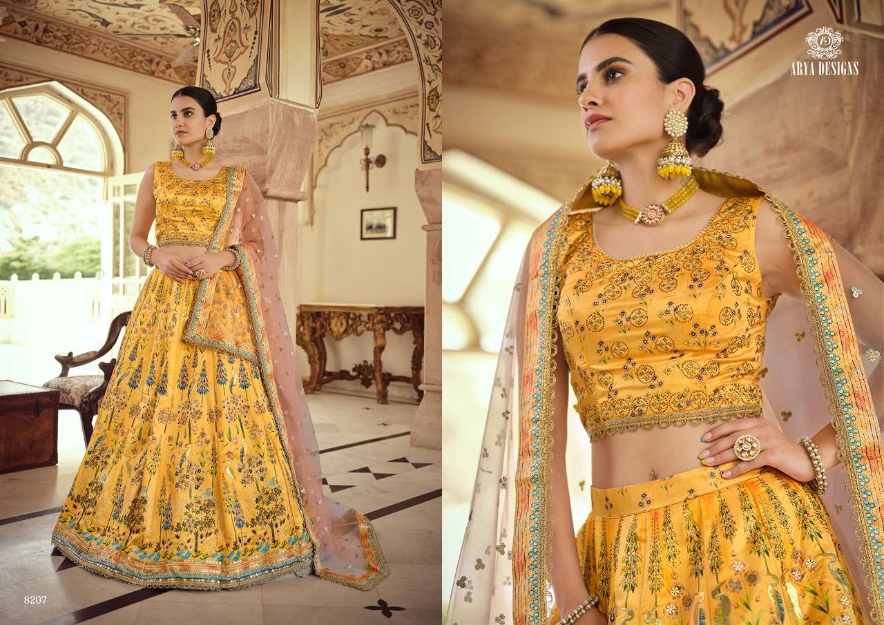 ROYAL SAGA VOL-2 BY ARYA DESIGNS 8201 TO 8207 SERIES BEAUTIFUL COLORFUL FANCY WEDDING COLLECTION OCCASIONAL WEAR & PARTY WEAR GEORGETTE/CREPE/SILK LEHENGAS AT WHOLESALE PRICE