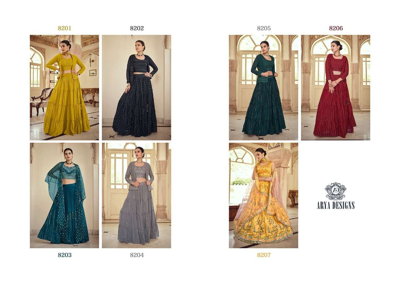 ROYAL SAGA VOL-2 BY ARYA DESIGNS 8201 TO 8207 SERIES BEAUTIFUL COLORFUL FANCY WEDDING COLLECTION OCCASIONAL WEAR & PARTY WEAR GEORGETTE/CREPE/SILK LEHENGAS AT WHOLESALE PRICE