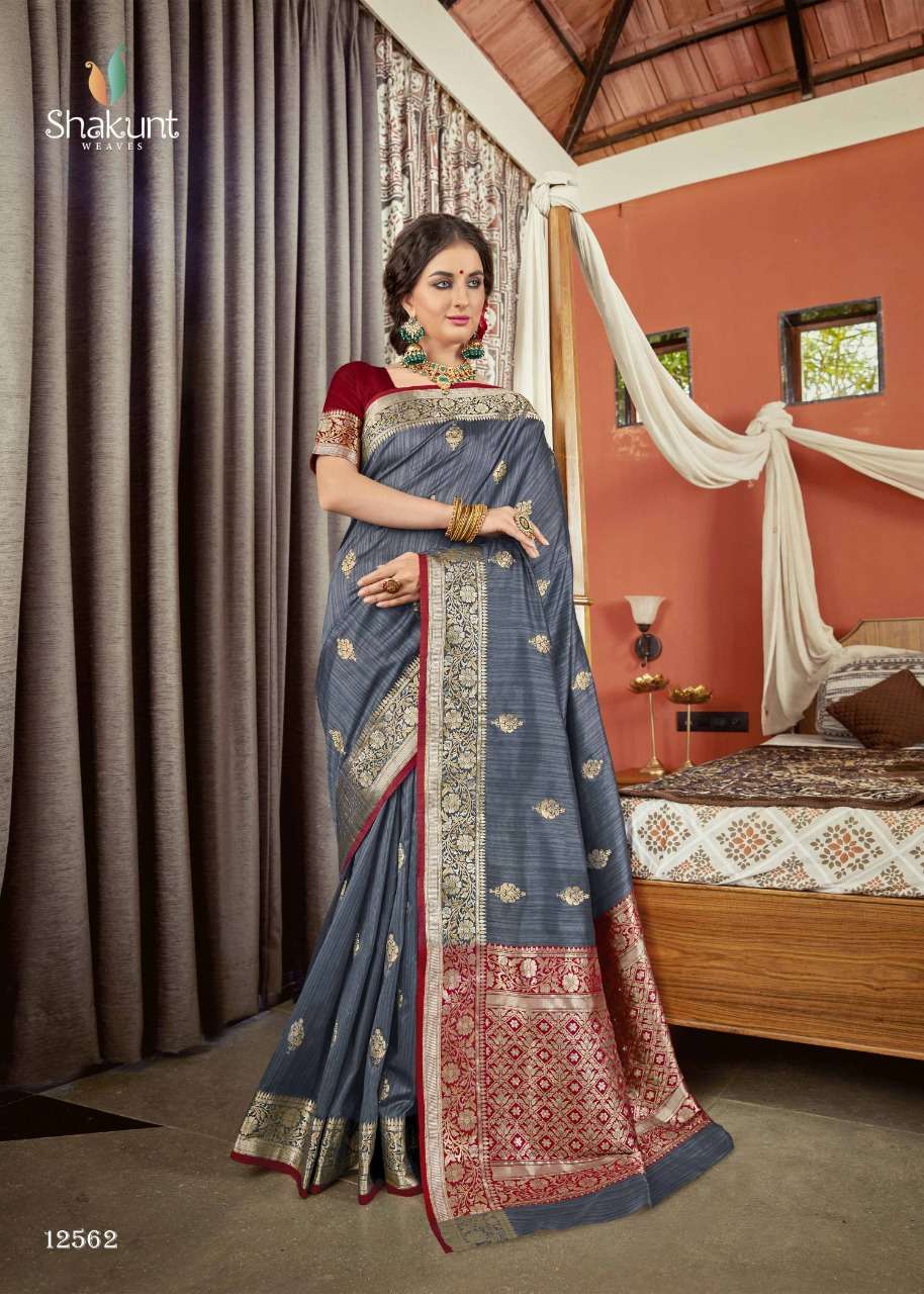 JAGMOHINI BY SHAKUNT 12561 TO 12566 SERIES INDIAN TRADITIONAL WEAR COLLECTION BEAUTIFUL STYLISH FANCY COLORFUL PARTY WEAR & OCCASIONAL WEAR SOFT SILK SAREES AT WHOLESALE PRICE