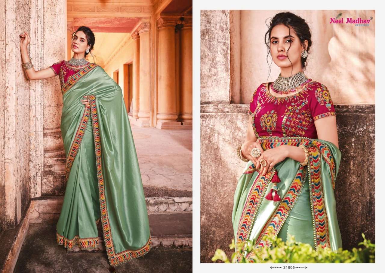 MIRISHA BY NEEL MADHAV 21001 TO 21015 SERIES INDIAN TRADITIONAL WEAR COLLECTION BEAUTIFUL STYLISH FANCY COLORFUL PARTY WEAR & OCCASIONAL WEAR FANCY SAREES AT WHOLESALE PRICE