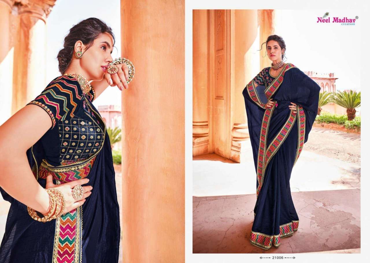 MIRISHA BY NEEL MADHAV 21001 TO 21015 SERIES INDIAN TRADITIONAL WEAR COLLECTION BEAUTIFUL STYLISH FANCY COLORFUL PARTY WEAR & OCCASIONAL WEAR FANCY SAREES AT WHOLESALE PRICE