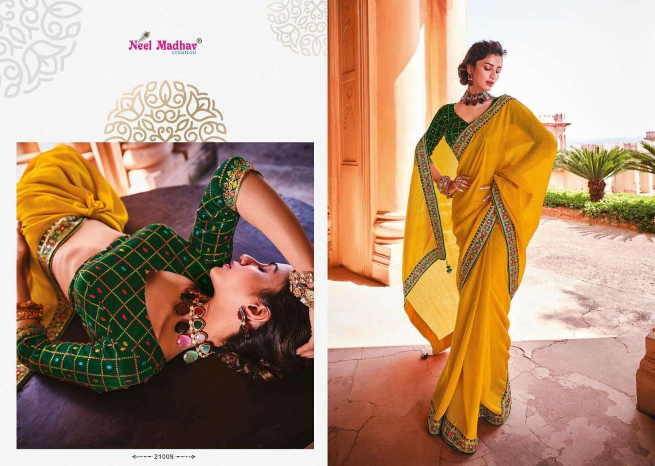 MIRISHA BY NEEL MADHAV 21001 TO 21015 SERIES INDIAN TRADITIONAL WEAR COLLECTION BEAUTIFUL STYLISH FANCY COLORFUL PARTY WEAR & OCCASIONAL WEAR FANCY SAREES AT WHOLESALE PRICE