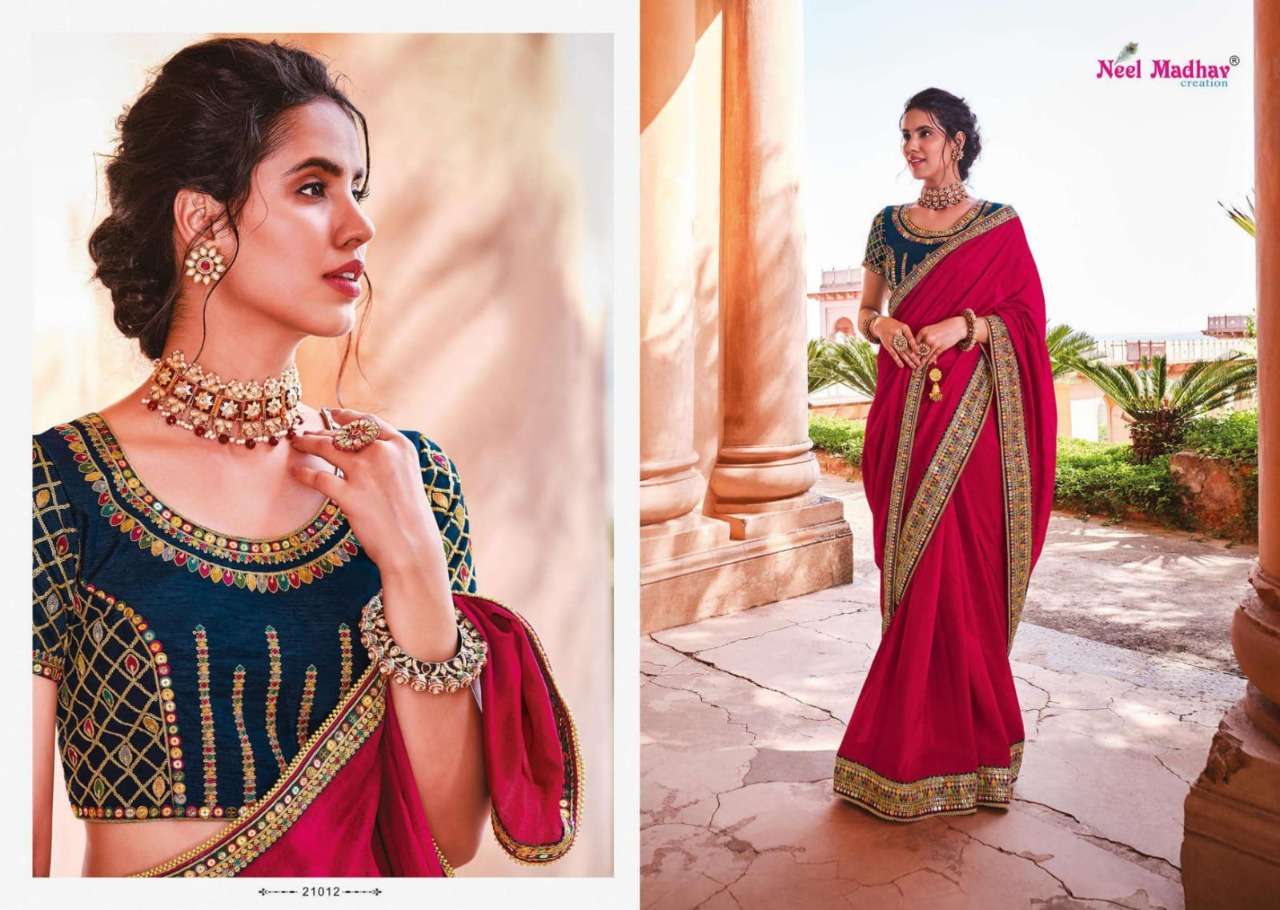 MIRISHA BY NEEL MADHAV 21001 TO 21015 SERIES INDIAN TRADITIONAL WEAR COLLECTION BEAUTIFUL STYLISH FANCY COLORFUL PARTY WEAR & OCCASIONAL WEAR FANCY SAREES AT WHOLESALE PRICE