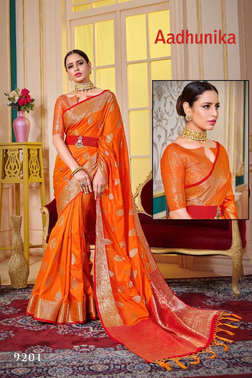 AADHUNIKA BY RAJYOG 9201 TO 9206 SERIES INDIAN TRADITIONAL WEAR COLLECTION BEAUTIFUL STYLISH FANCY COLORFUL PARTY WEAR & OCCASIONAL WEAR SOFT SILK SAREES AT WHOLESALE PRICE