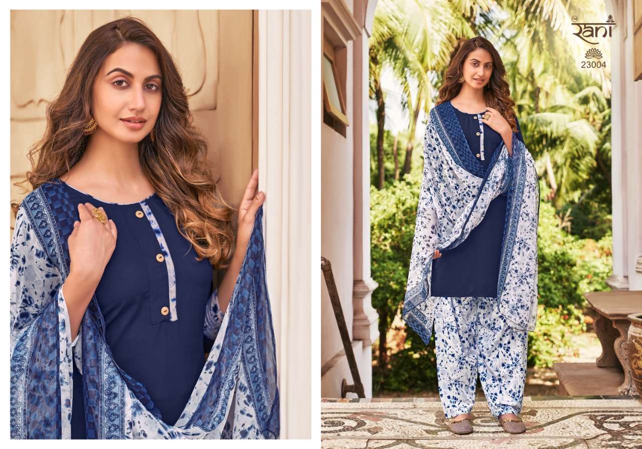 SUNHERI VOL-23 BY RANI FASHION 23001 TO 23016 SERIES BEAUTIFUL STYLISH SUITS FANCY COLORFUL CASUAL WEAR & ETHNIC WEAR & READY TO WEAR HEAVY AMERICAN CREPE PRINTED DRESSES AT WHOLESALE PRICE