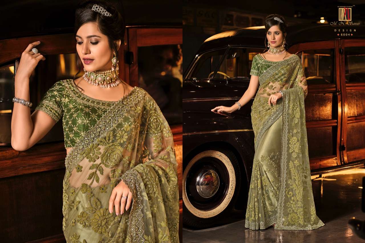 SWAROVSKI VOL-3 BY M N SAREES 6001 TO 6015 SERIES INDIAN TRADITIONAL WEAR COLLECTION BEAUTIFUL STYLISH FANCY COLORFUL PARTY WEAR & OCCASIONAL WEAR NET SAREES AT WHOLESALE PRICE