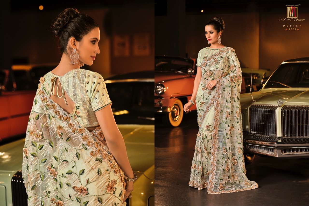 SWAROVSKI VOL-3 BY M N SAREES 6001 TO 6015 SERIES INDIAN TRADITIONAL WEAR COLLECTION BEAUTIFUL STYLISH FANCY COLORFUL PARTY WEAR & OCCASIONAL WEAR NET SAREES AT WHOLESALE PRICE