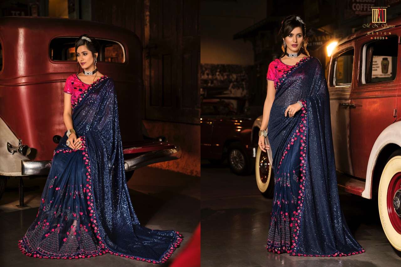 SWAROVSKI VOL-3 BY M N SAREES 6001 TO 6015 SERIES INDIAN TRADITIONAL WEAR COLLECTION BEAUTIFUL STYLISH FANCY COLORFUL PARTY WEAR & OCCASIONAL WEAR NET SAREES AT WHOLESALE PRICE