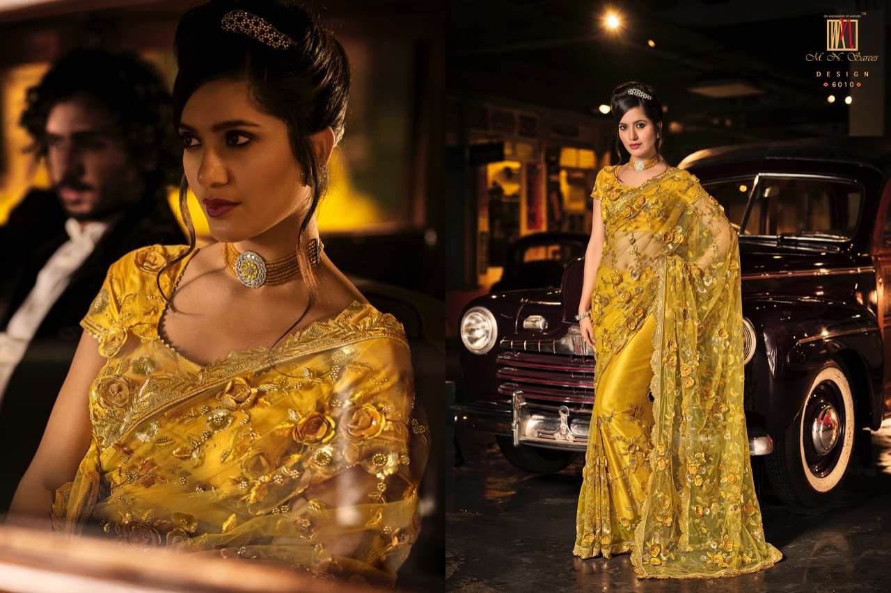 SWAROVSKI VOL-3 BY M N SAREES 6001 TO 6015 SERIES INDIAN TRADITIONAL WEAR COLLECTION BEAUTIFUL STYLISH FANCY COLORFUL PARTY WEAR & OCCASIONAL WEAR NET SAREES AT WHOLESALE PRICE