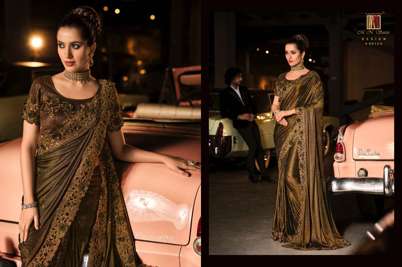 SWAROVSKI VOL-3 BY M N SAREES 6001 TO 6015 SERIES INDIAN TRADITIONAL WEAR COLLECTION BEAUTIFUL STYLISH FANCY COLORFUL PARTY WEAR & OCCASIONAL WEAR NET SAREES AT WHOLESALE PRICE