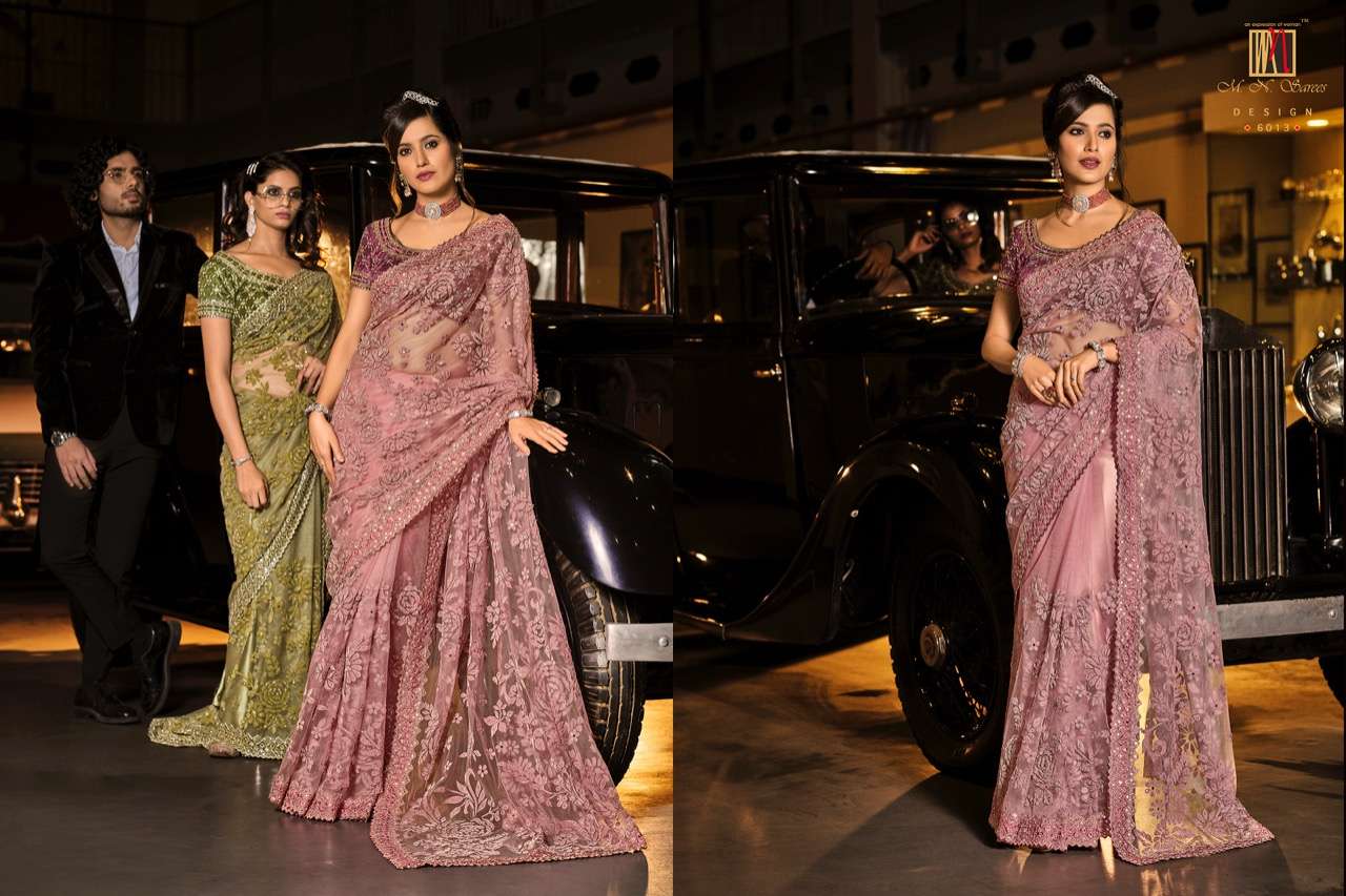 SWAROVSKI VOL-3 BY M N SAREES 6001 TO 6015 SERIES INDIAN TRADITIONAL WEAR COLLECTION BEAUTIFUL STYLISH FANCY COLORFUL PARTY WEAR & OCCASIONAL WEAR NET SAREES AT WHOLESALE PRICE