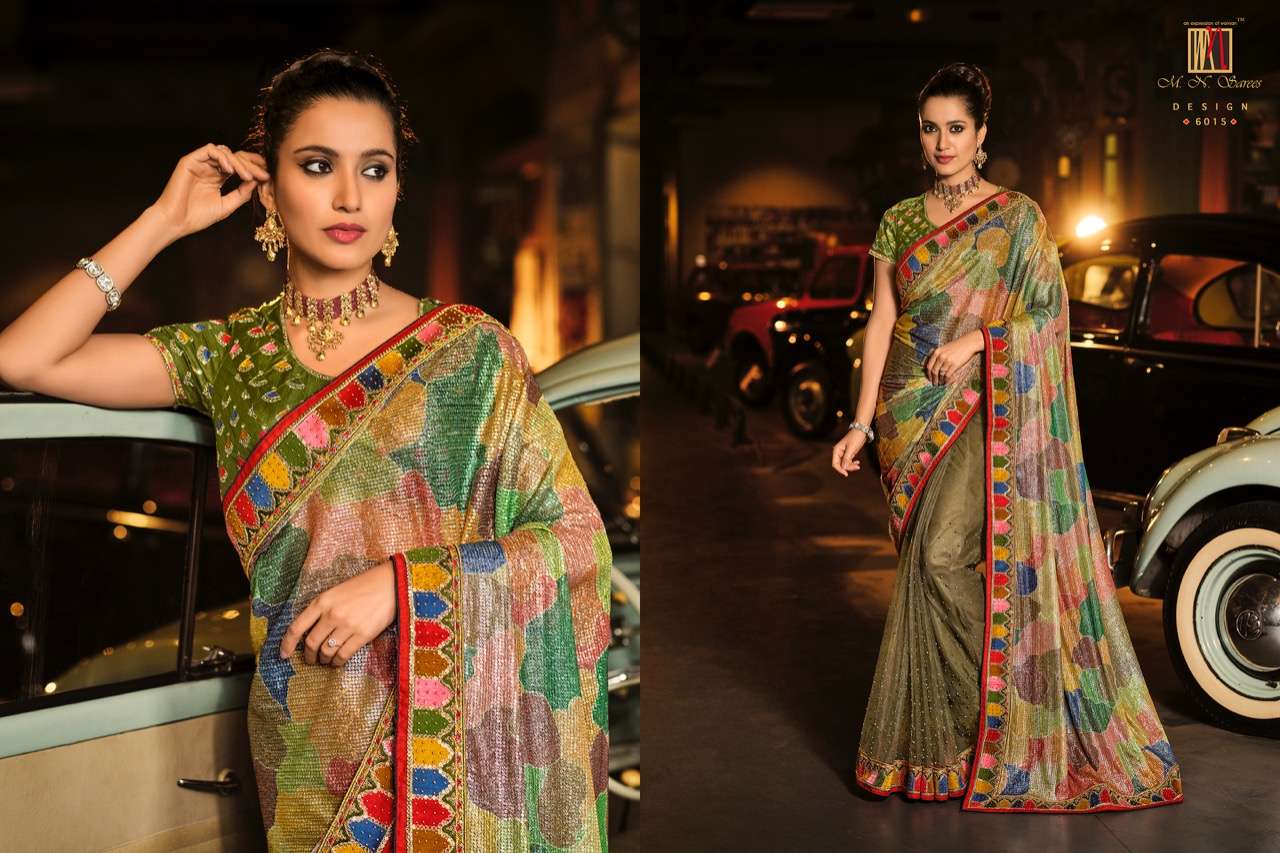 SWAROVSKI VOL-3 BY M N SAREES 6001 TO 6015 SERIES INDIAN TRADITIONAL WEAR COLLECTION BEAUTIFUL STYLISH FANCY COLORFUL PARTY WEAR & OCCASIONAL WEAR NET SAREES AT WHOLESALE PRICE