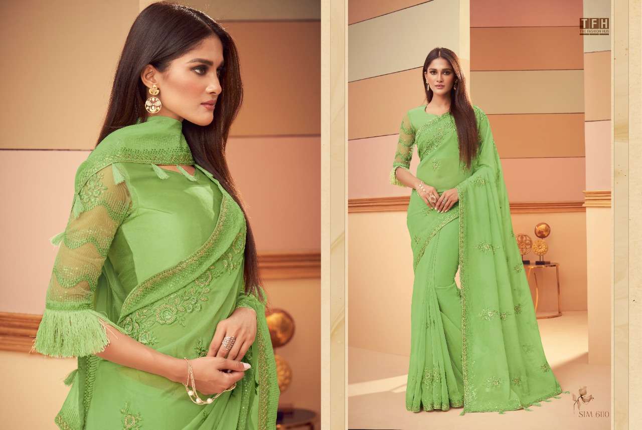 SIMRAN STORY BY TFH INDIAN TRADITIONAL WEAR COLLECTION BEAUTIFUL STYLISH FANCY COLORFUL PARTY WEAR & OCCASIONAL WEAR FANCY SAREES AT WHOLESALE PRICE