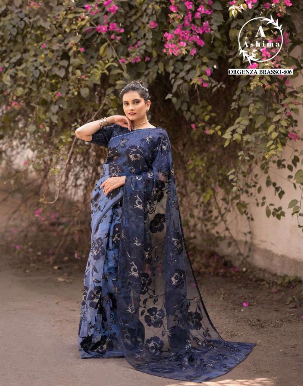 ORGANZA BRASSO BY ASHIMA 601 TO 608 SERIES INDIAN TRADITIONAL WEAR COLLECTION BEAUTIFUL STYLISH FANCY COLORFUL PARTY WEAR & OCCASIONAL WEAR ORGANZA BRASSO SAREES AT WHOLESALE PRICE