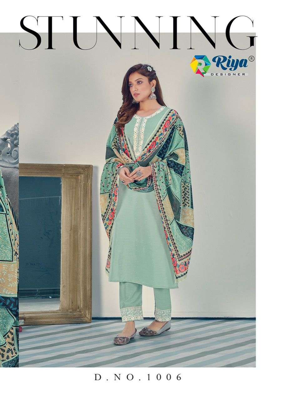 GLAMOROUS BY RIYA DESIGNER 1001 TO 1006 SERIES BEAUTIFUL SUITS COLORFUL STYLISH FANCY CASUAL WEAR & ETHNIC WEAR CHINNON WITH WORK DRESSES AT WHOLESALE PRICE