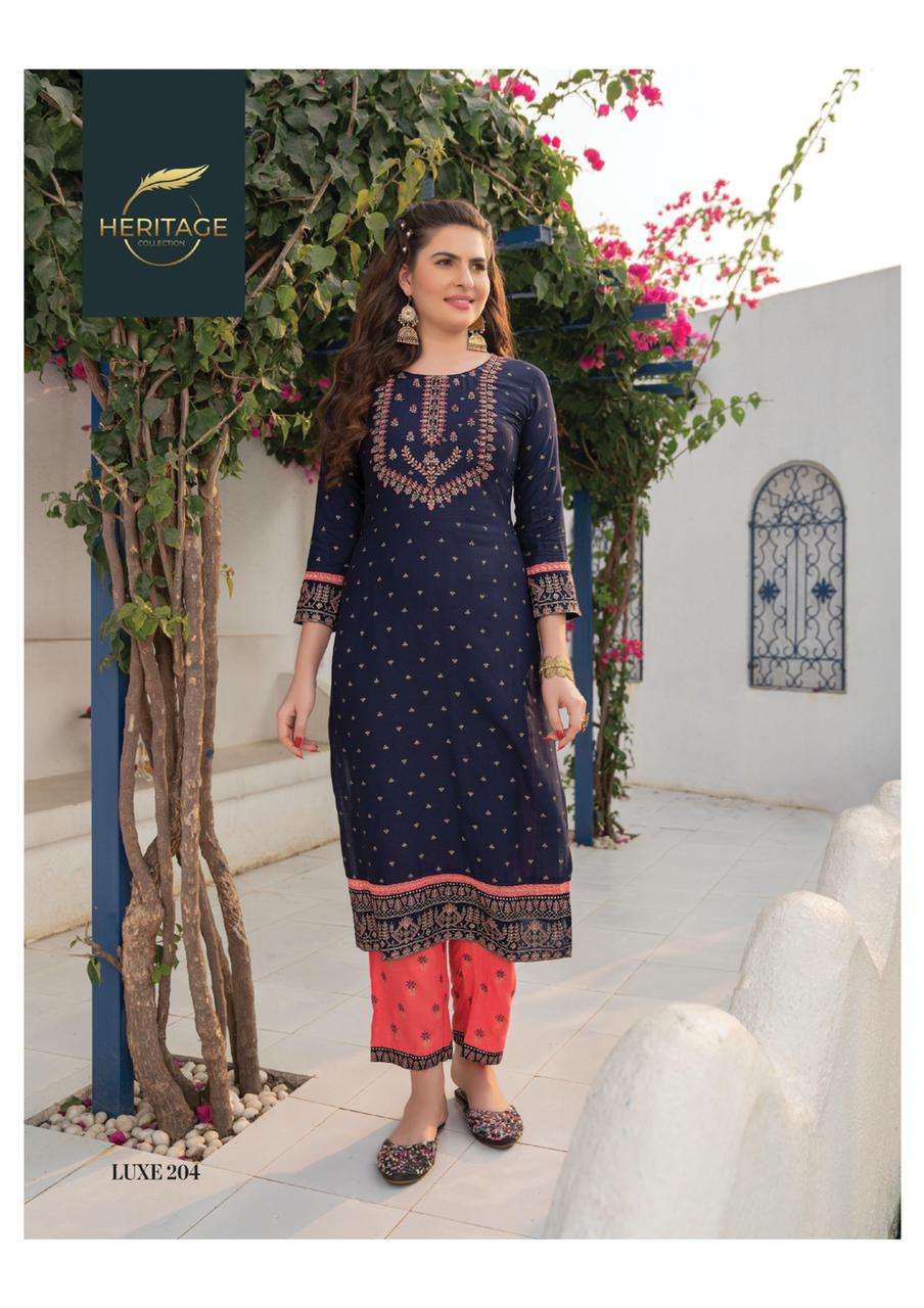 LUXE VOl-2 BY HERITAGE 201 TO 206 SERIES DESIGNER STYLISH FANCY COLORFUL BEAUTIFUL PARTY WEAR & ETHNIC WEAR COLLECTION RAYON KURTIS WITH BOTTOM AT WHOLESALE PRICE