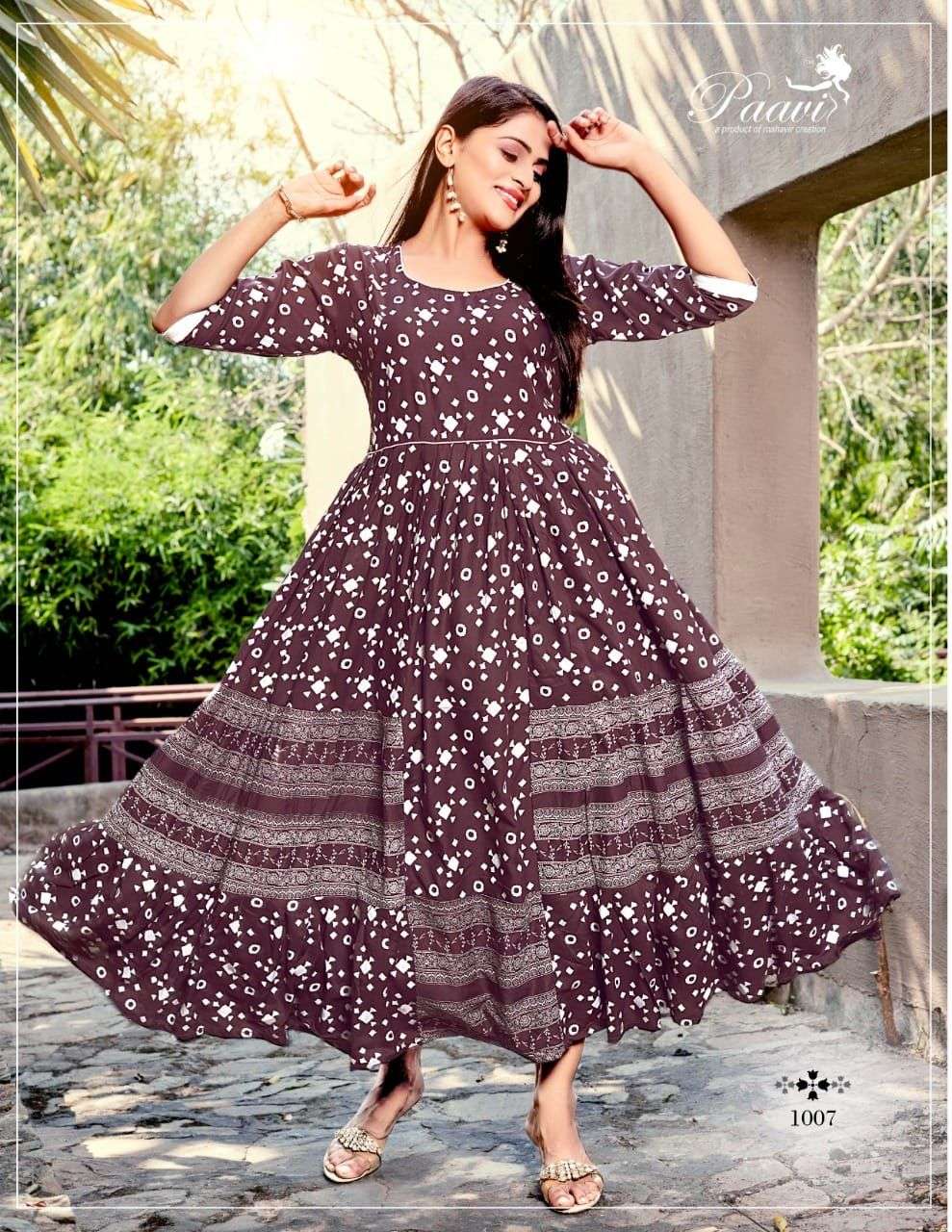 FLERA BY PAAVI 1001 TO 1008 SERIES BEAUTIFUL STYLISH FANCY COLORFUL CASUAL WEAR & ETHNIC WEAR RAYON PRINT GOWNS AT WHOLESALE PRICE