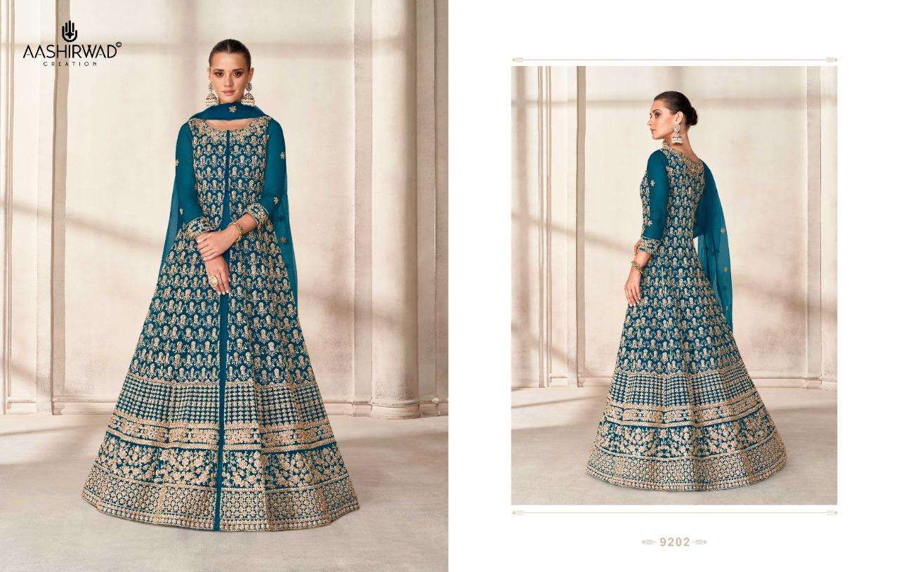 PRISHA BY AASHIRWAD CREATION 9199 TO 9203 SERIES BEAUTIFUL ANARKALI SUITS COLORFUL STYLISH FANCY CASUAL WEAR & ETHNIC WEAR BUTTERFLY NET DRESSES AT WHOLESALE PRICE