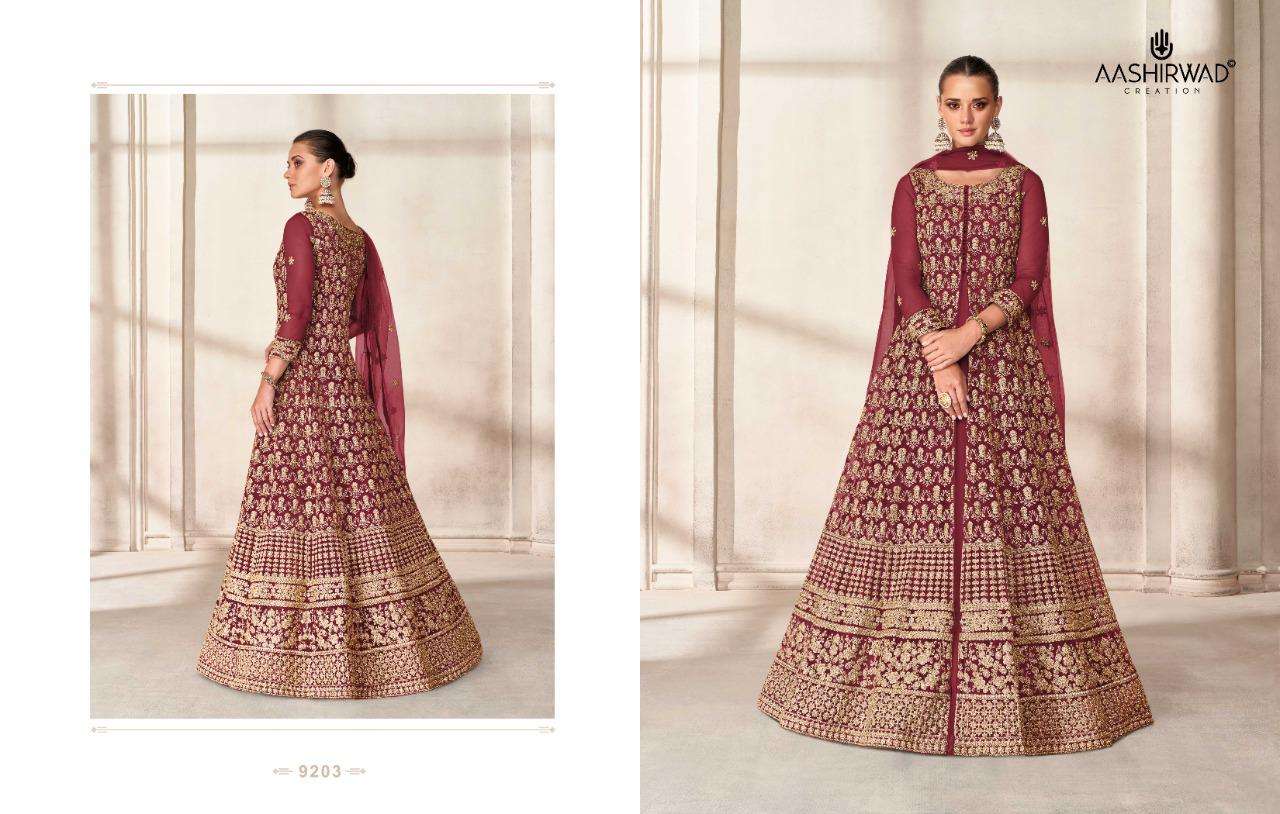 PRISHA BY AASHIRWAD CREATION 9199 TO 9203 SERIES BEAUTIFUL ANARKALI SUITS COLORFUL STYLISH FANCY CASUAL WEAR & ETHNIC WEAR BUTTERFLY NET DRESSES AT WHOLESALE PRICE