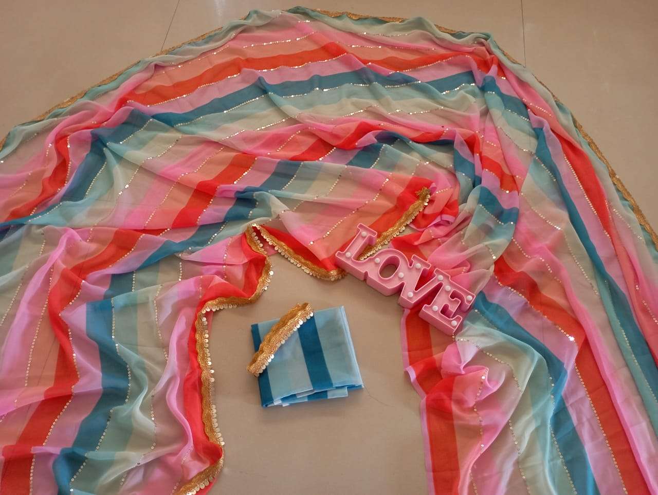 PC KOMAL LEHARIYA RAINBOW BY FASHID WHOLESALE INDIAN TRADITIONAL WEAR COLLECTION BEAUTIFUL STYLISH FANCY COLORFUL PARTY WEAR & OCCASIONAL WEAR GEORGETTE PRINT SAREES AT WHOLESALE PRICE