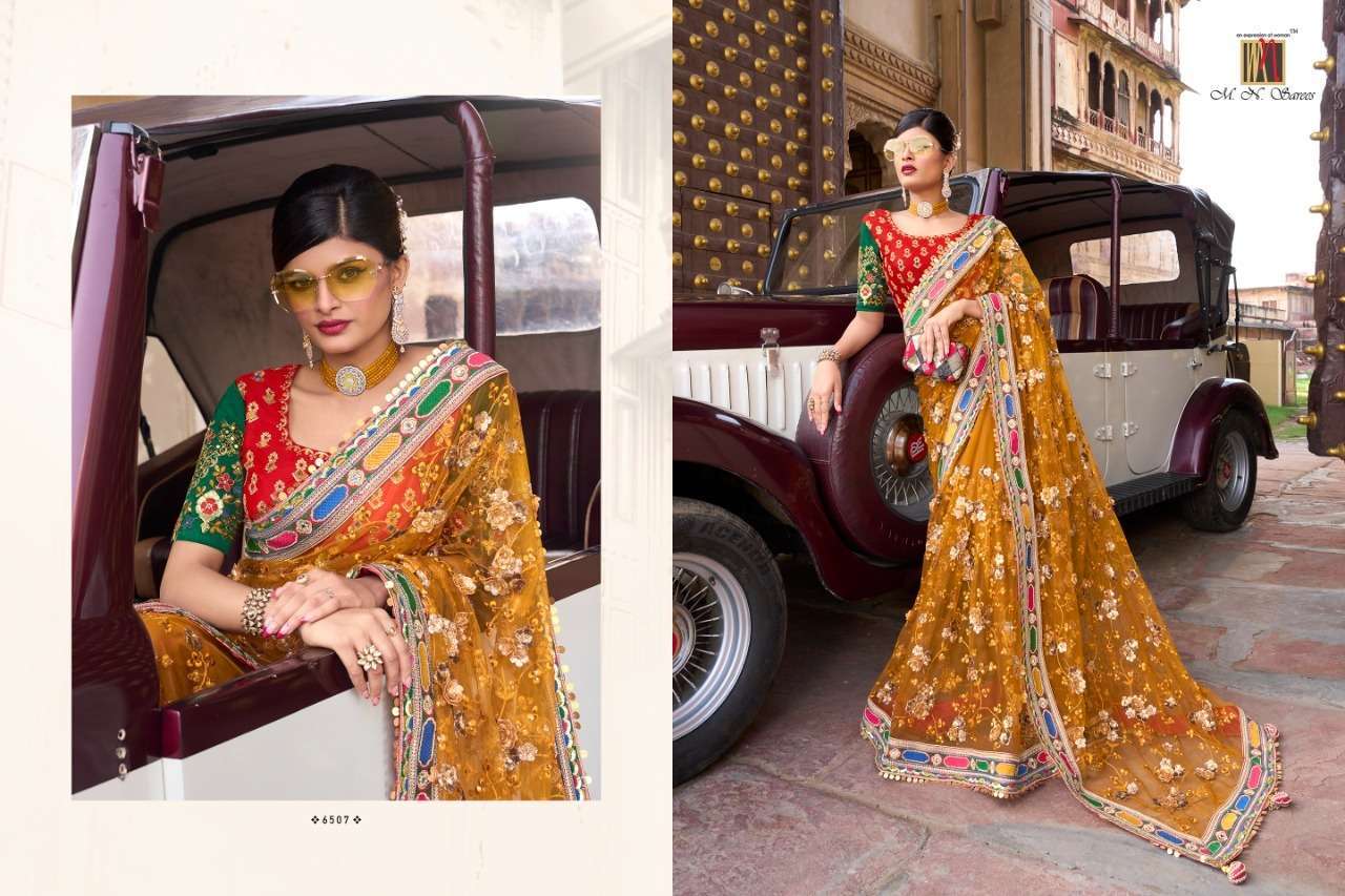Swarovski Vol-5 By M.N. Sarees 6501 To 6512 Series Indian Traditional Beautiful Stylish Designer Banarasi Silk Jacquard Embroidered Party Wear Net Sarees At Wholesale Price