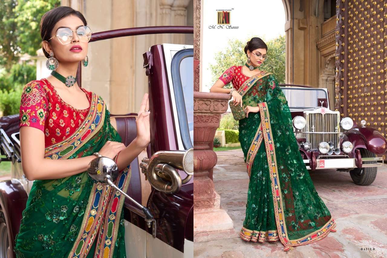 Swarovski Vol-5 By M.N. Sarees 6501 To 6512 Series Indian Traditional Beautiful Stylish Designer Banarasi Silk Jacquard Embroidered Party Wear Net Sarees At Wholesale Price