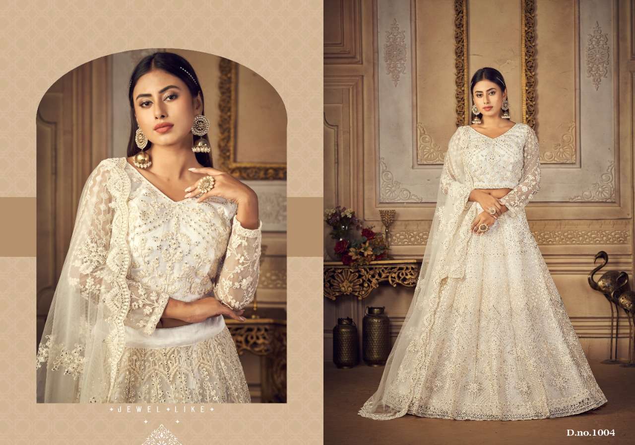 Bridal Ensemble By Vouche 1001 To 1005 Series Beautiful Colorful Fancy Wedding Collection Occasional Wear & Party Wear Net Embroidered Lehengas At Wholesale Price