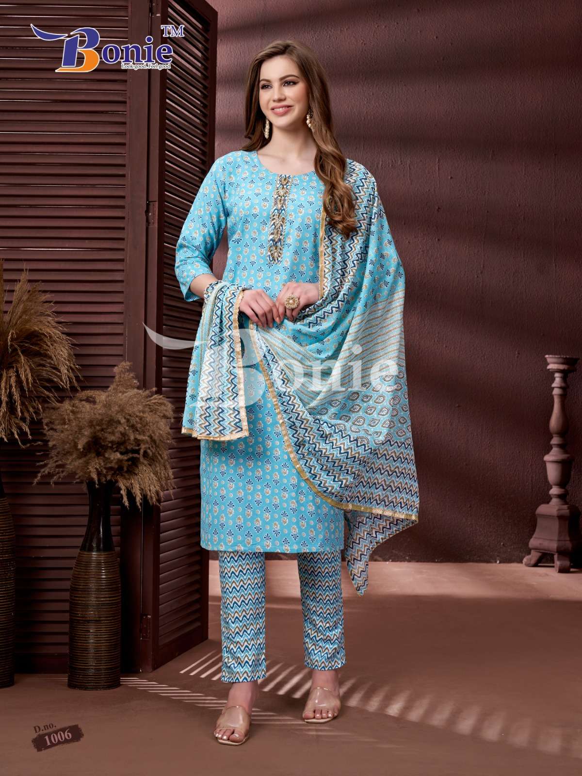 Desi Kudi By Bonie 1001 To 1006 Series Beautiful Suits Colorful Stylish Fancy Casual Wear & Ethnic Wear Rayon Print Dresses At Wholesale Price